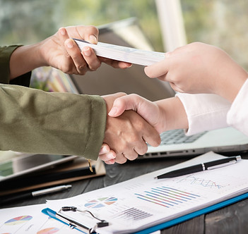 business-people-shaking-hands-finishing-up-meeting.jpg