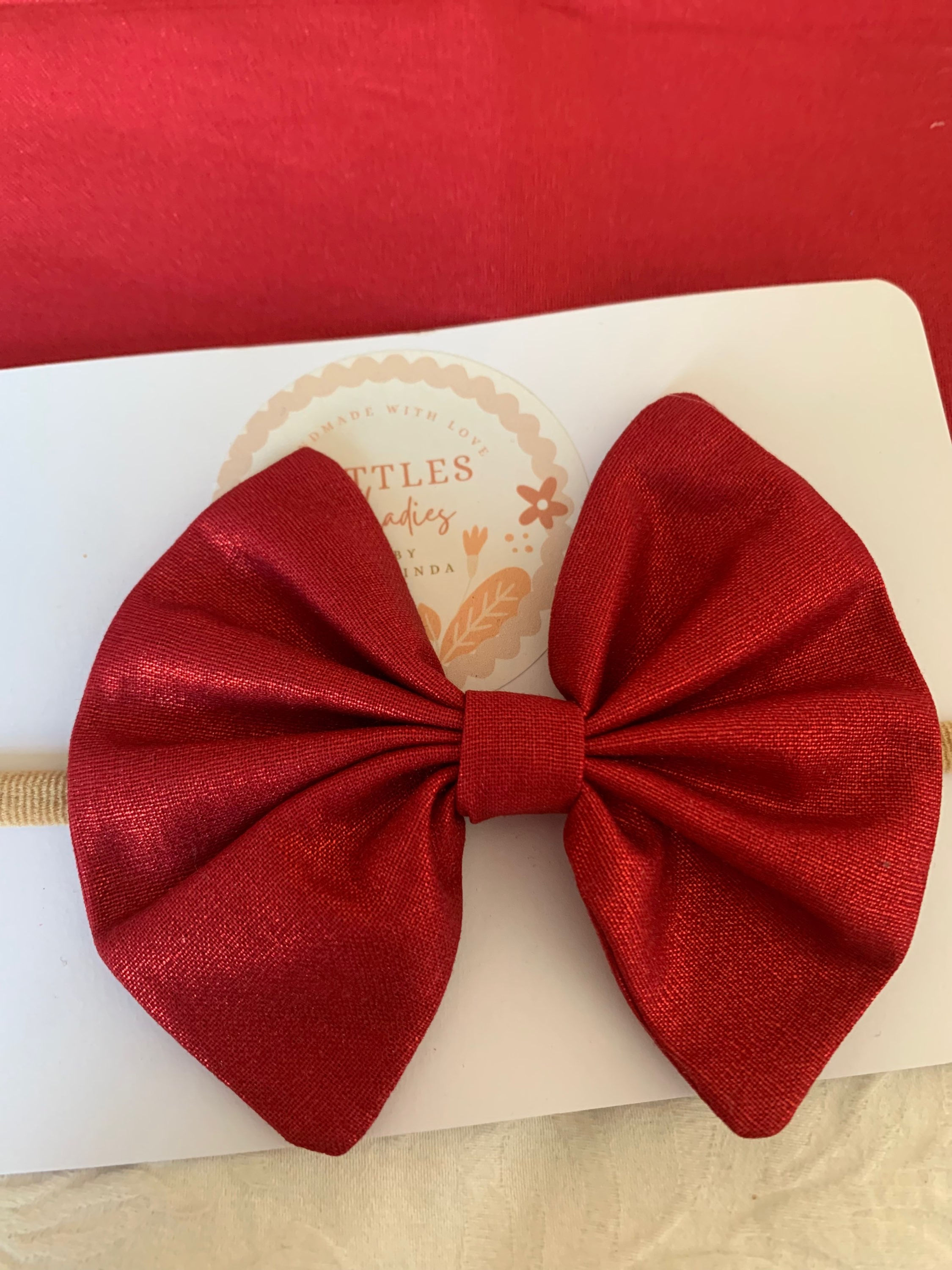 Red Satin Shimmer large bow (4”)  on soft nylon headband 