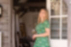 Abbie Bleasby-Voice, founder of Wine at Mine, wine tasting events, holding a glass of wine