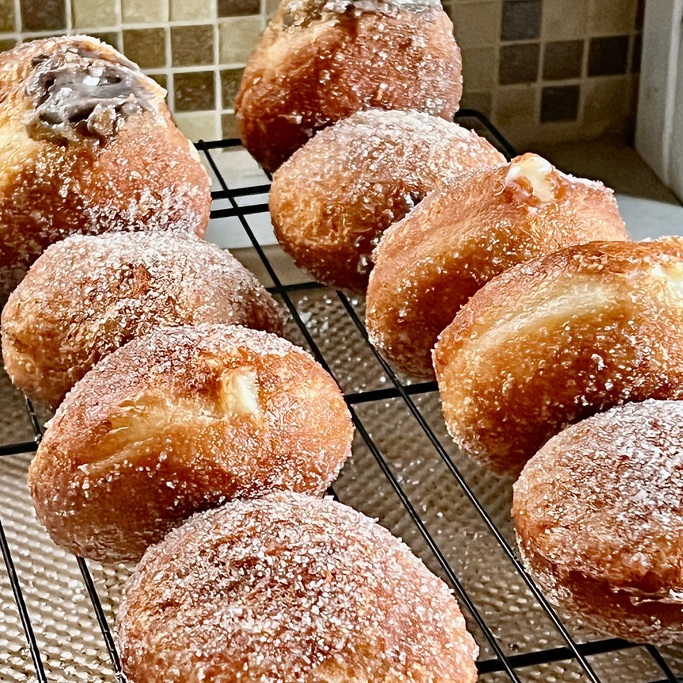 Tray of paczki, or filled donuts