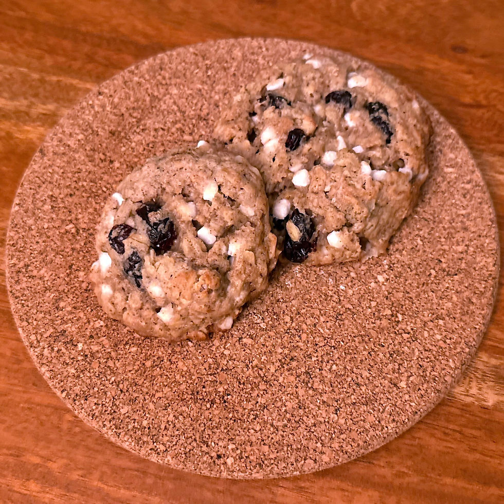 One regular and one large white chocolate cranberry oatmeal