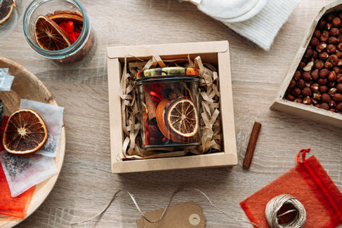 fruit filled mason jar in a box