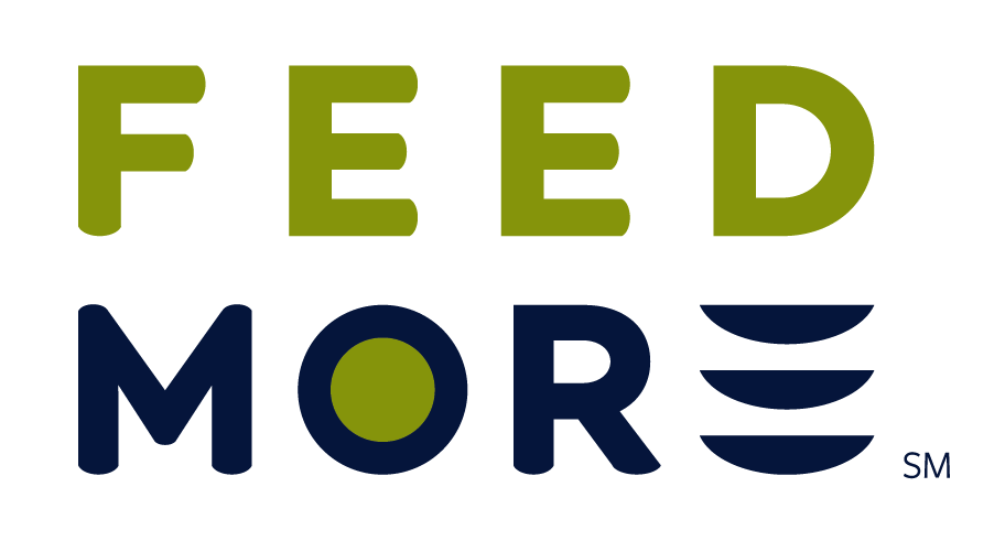 The Feed More Logo is stacked with the word FEED in light green writing on top of the word MORE in dark blue writing. The O in MORE is filled with the same light green color, and the E in More looks like three plates stacked on top of each other to represent the three horizontal lines in an E. The word more is followed by SM (Service Mark) in small subscript.