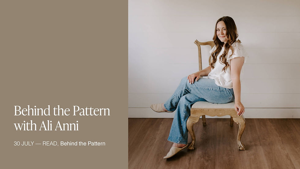Behind the pattern graphic featuring an interview with wallpaper artist Ali Anni, seated and smiling at the camera