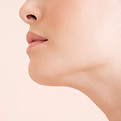 woman-s-lips-chin-and-neck-against-pink-backgroun-2026-03-27-02-01-58-utc.jpg