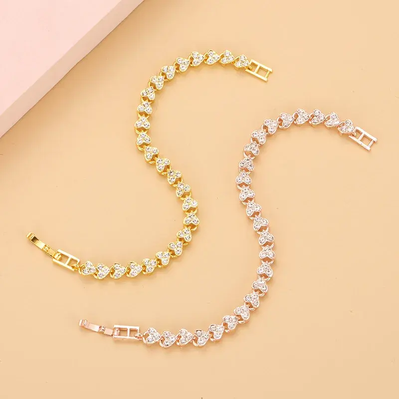 Miniatura: Pulseira feminina prateada com detalhes rosa