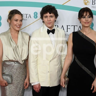 Guests on the BAFTA red carpet with evening makeup and hair