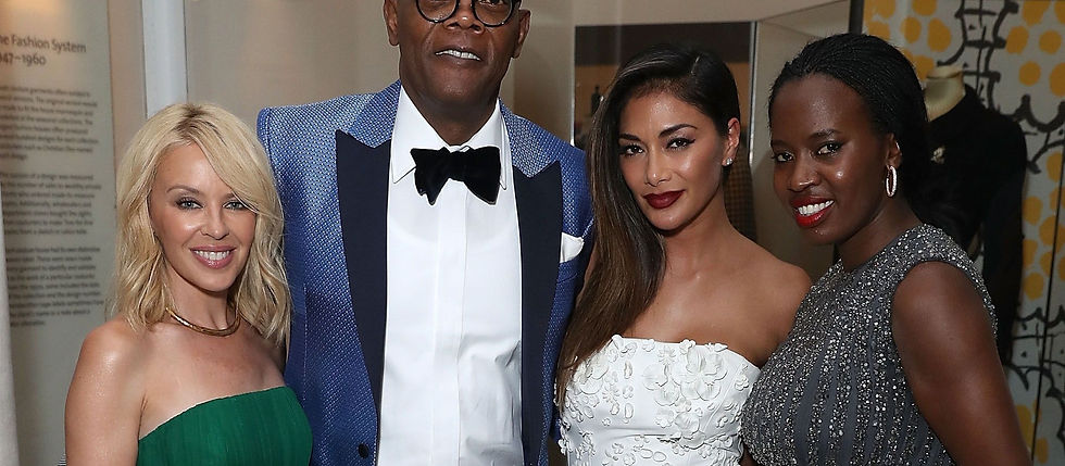 Guests in evening gowns with glam makeup at a London black tie event