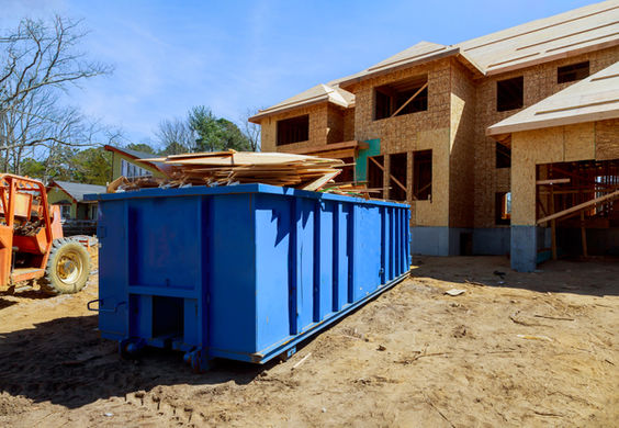 Construction trash dumpsters on metal container, house renovation..jpg