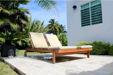 Relaxing lounge chairs by the poolside