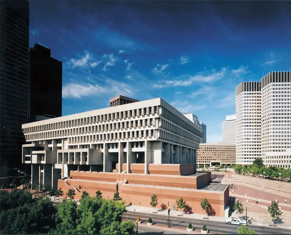 Iconic civic building with sculptural concrete forms and tiered façade.