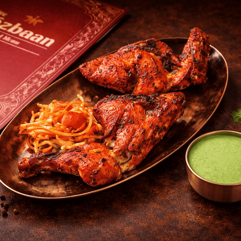 Tandoori chicken with mint chutney served at Hotel Mezbaan in Raipur.
