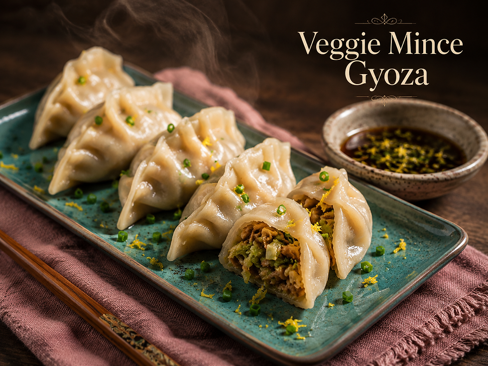 Steamed veggie mince gyoza dumplings with glossy wrappers served with citrus soy dipping sauce