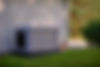 Briggs & Stratton 26P Generator next to a house.