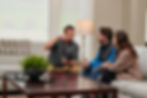 Generator tech explaining standby generator to homeowners