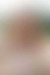 Close up of bride looking off in to distance at Botleys Mansion wedding