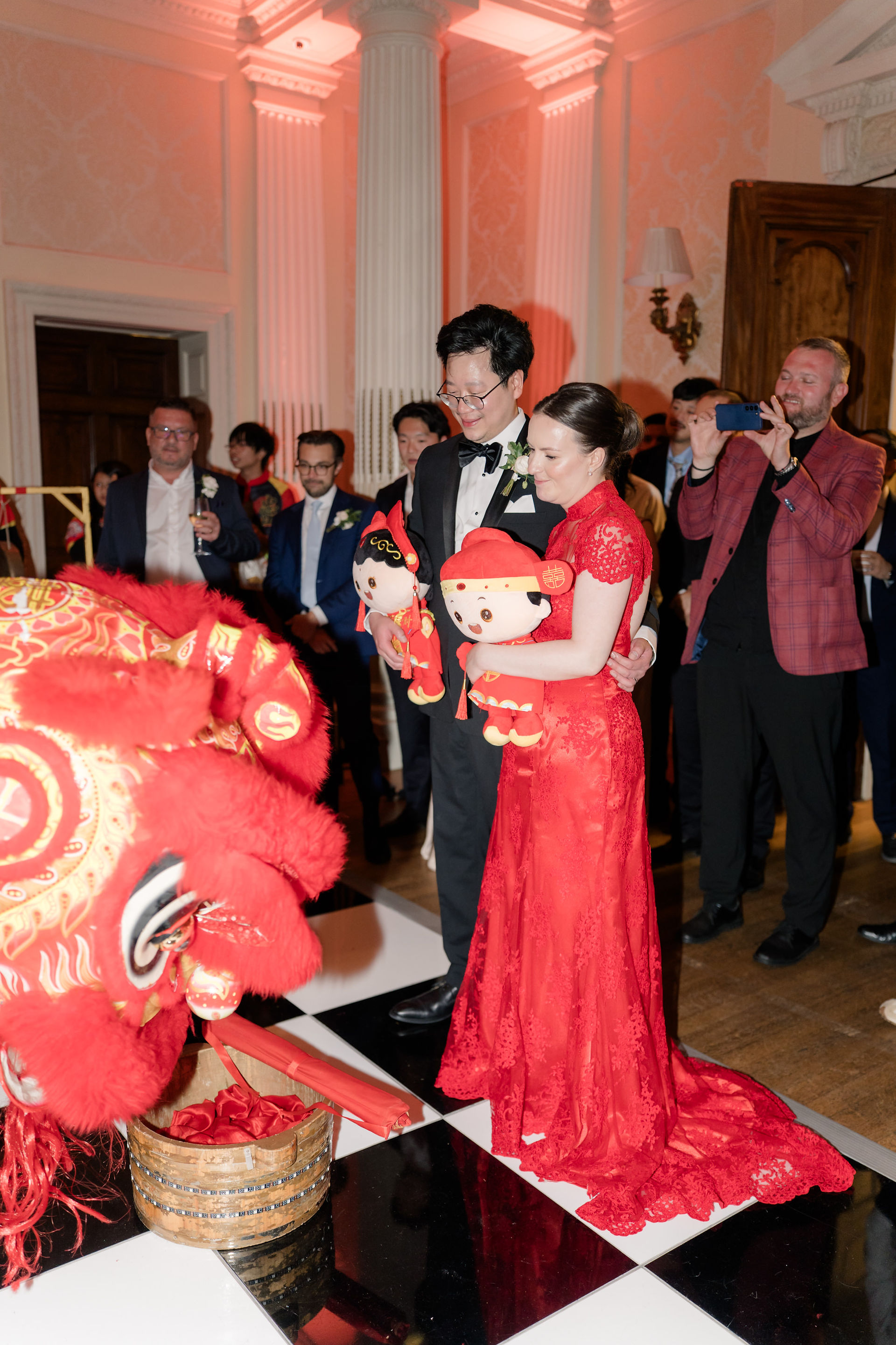 Bride and groom in Chinese ceremony at Hedsor house wedding photographer