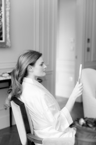 Bride having hair done at savoy hotel wedding