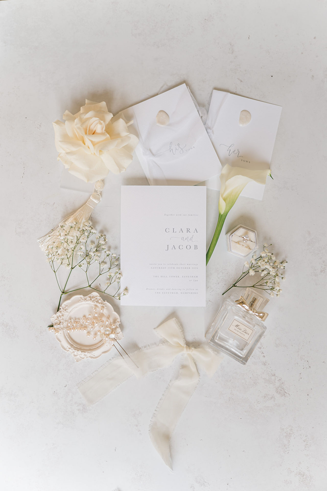 Flat lay of wedding invite at wedding at Elvetham hotel 