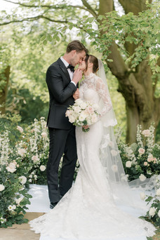 Bride and groom kissing at Foxhill Manor Wedding photographer