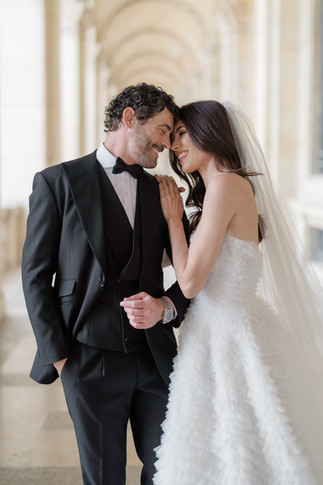 Bride and groom looking at each other captured by Paris wedding photographer