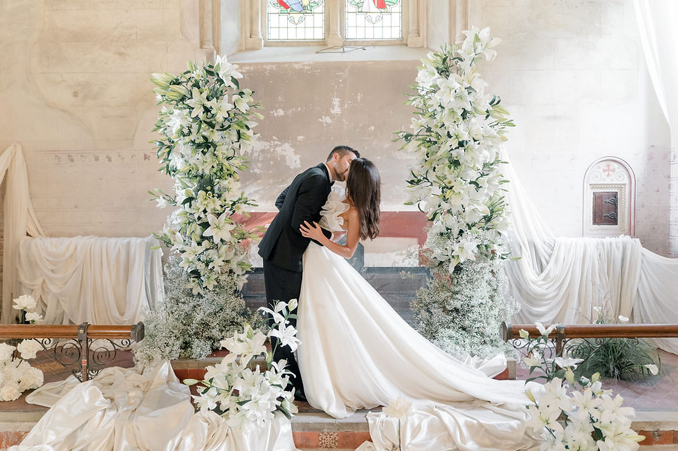 Elvetham hotel wedding styled shoot with bride and groom kissing