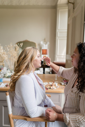 Wedding at Brympton house bride having makeup done