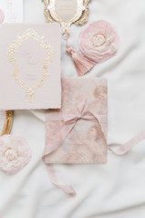 Flat lay of invitation suite taken by Chateau De Santeny Wedding Photographer