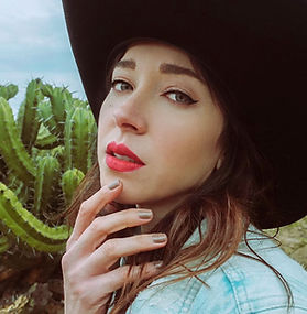 SUE POSADA
