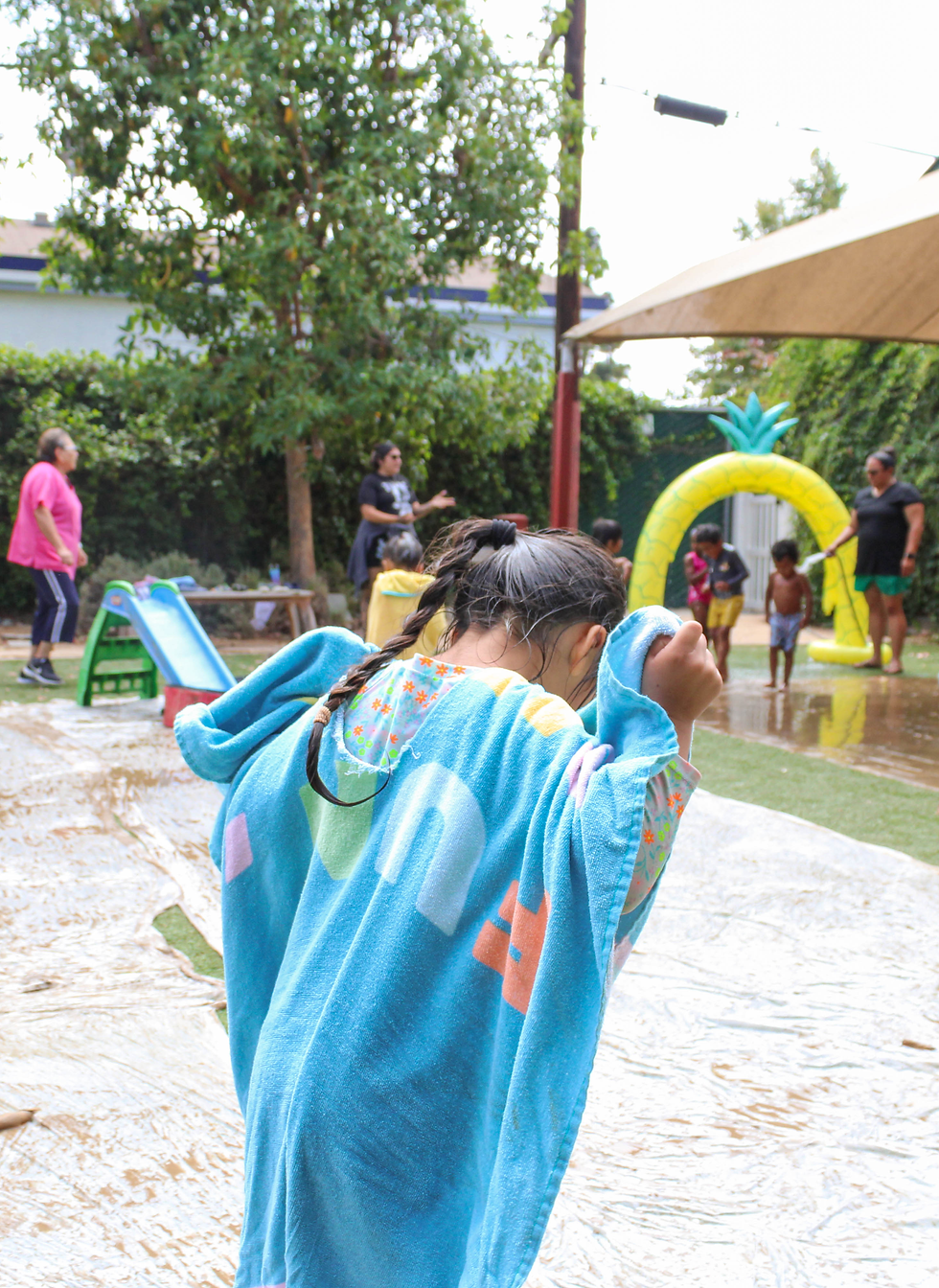 After a day full of fun our children rinse and dry off before heading back to their classrooms.
