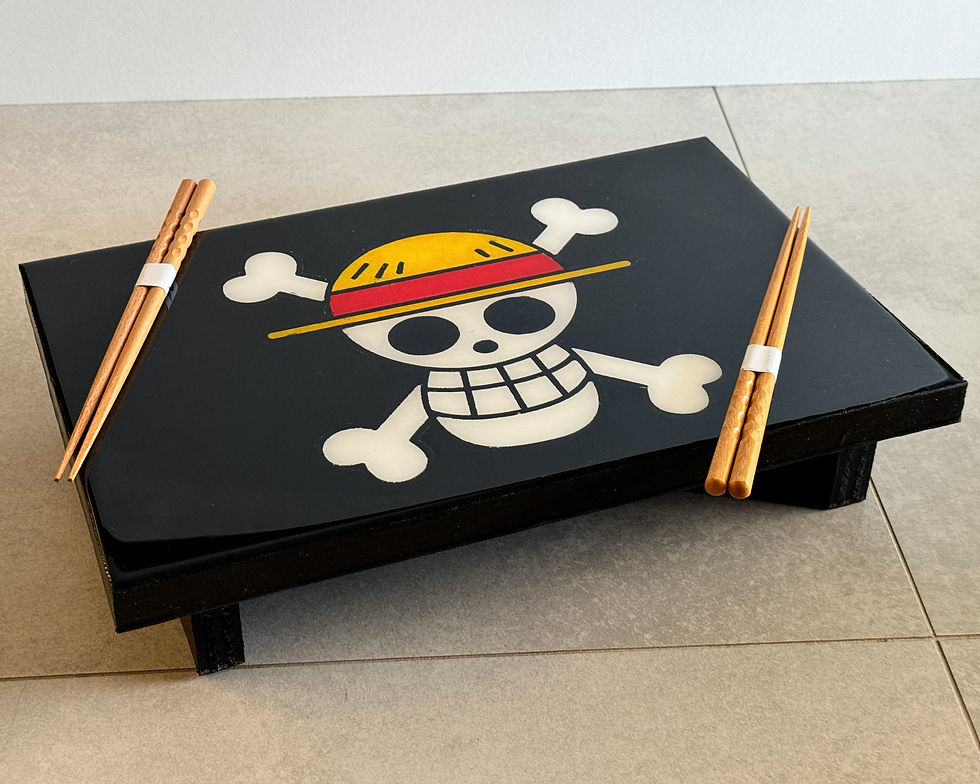 Custom pirate crew sushi serving board with skull and crossbones design on natural wood
