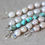 Thumbnail: FRESHWATER PEARL BRACELET WITH SAGE GREEN SILK THREAD