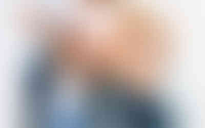 siblings holding mom's belly in CT studio maternity session