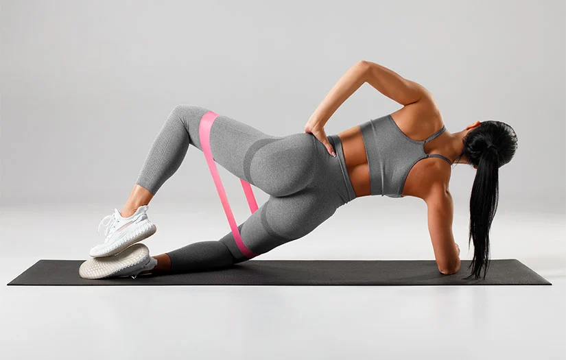 Our thoughts on "Activation" exercises, image of woman stretching