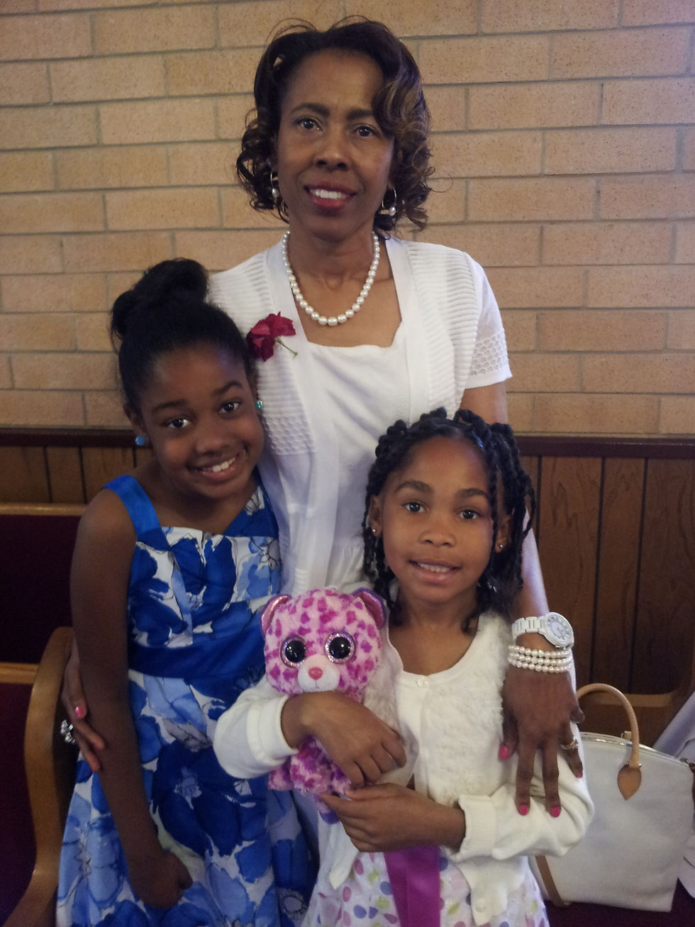 Mrs. Charlotte with the Ebron's grandkids