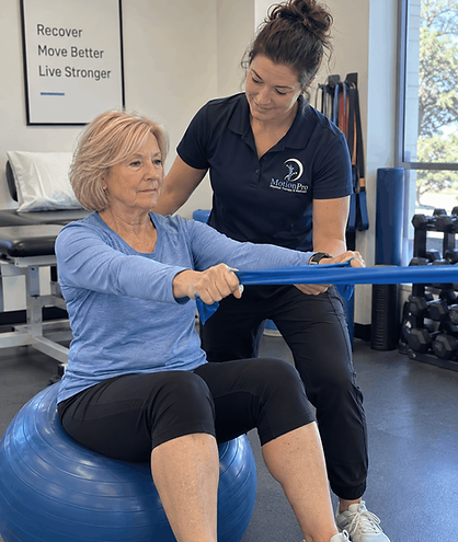 MotionPro physical therapist guiding a senior patient through seated balance and strength exercises during neurological rehabilitation in West Palm Beach.