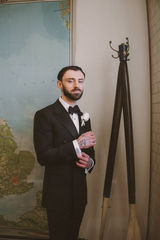 Will in a black tuxedo during wedding morning preparations