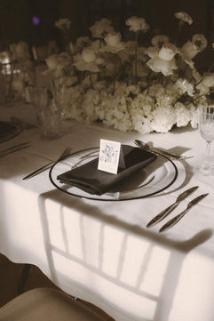 Black napkin and place setting at Georgia and Will’s wedding breakfast