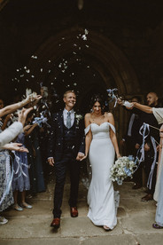 Wedding confetti throw outside church in Ashover, Peak District