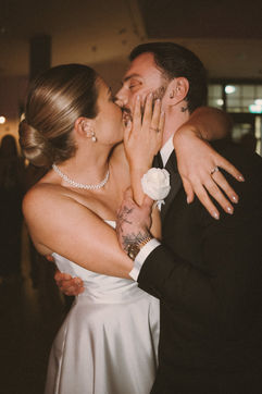 Georgia and Will celebrating with guests at their wedding party