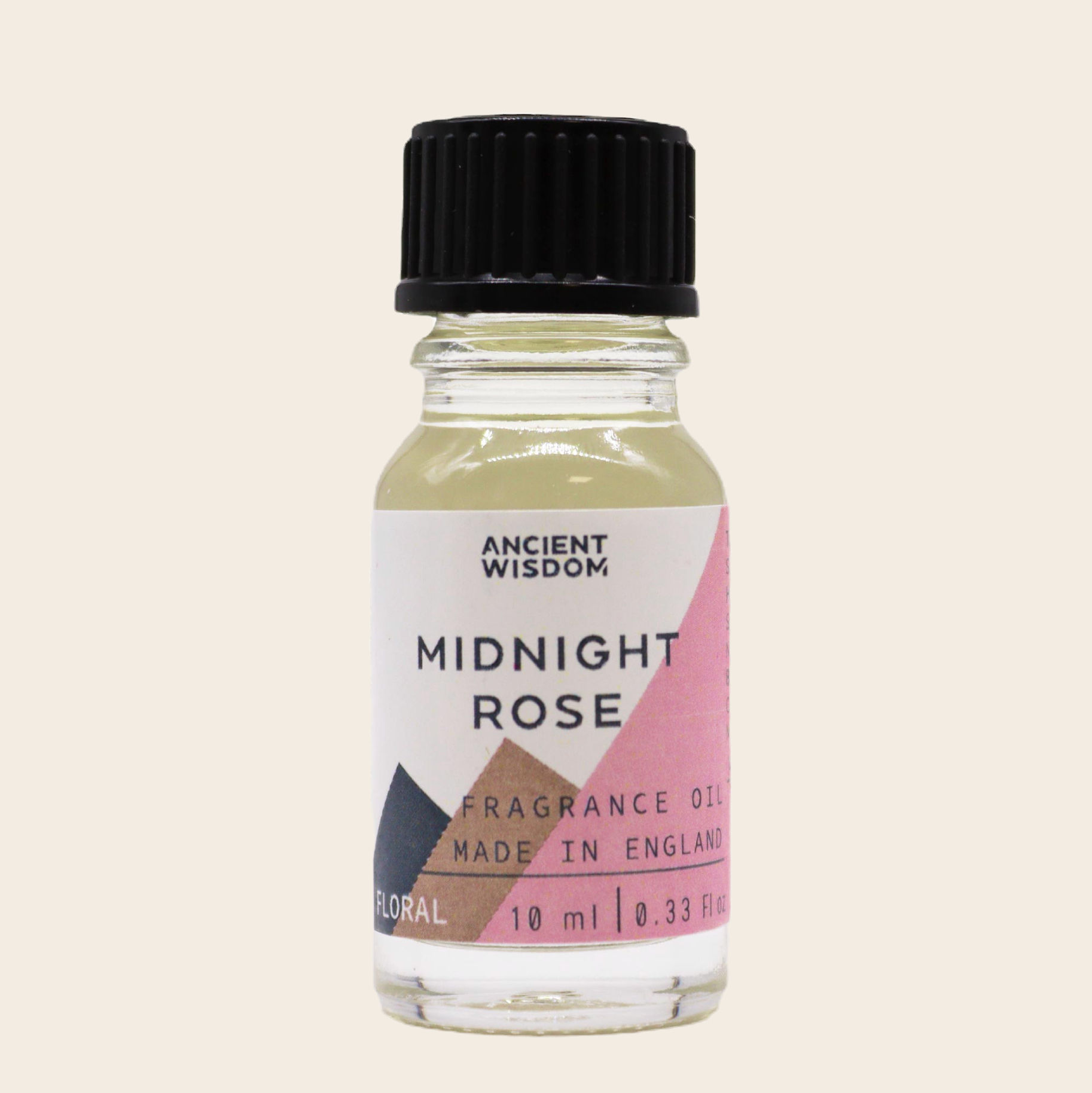 Ancient Wisdom Midnight Rose Fragrance Oil 10ml bottle on a beige background