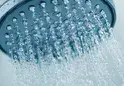 vecteezy_close-up-of-a-silver-shower-head-with-water-running_49933410-249-124.webp