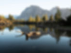 Lago Federa reflecting Becco di Mezzodì and surrounding Dolomites peaks near Rifugio Palmieri, a highlight of the guided Bike & Hike experience from Cortina.