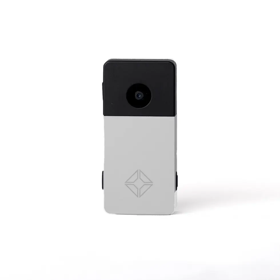 Silver and black Trezor Model T hardware wallet on a white background.