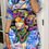 Thumbnail: Woman in colorful dress with text and face graphic Madame Curves fashion style