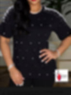 Woman in black top with white dots and bracelet, Madame Curves product.