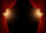Opulent theater curtains reveal glowing backdrop_edited.jpg