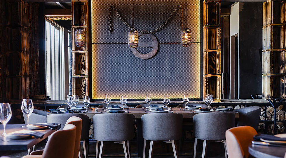 Elegant steakhouse interior at Origen Gilbert