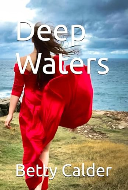 girl in red dress walking to ocean cliff