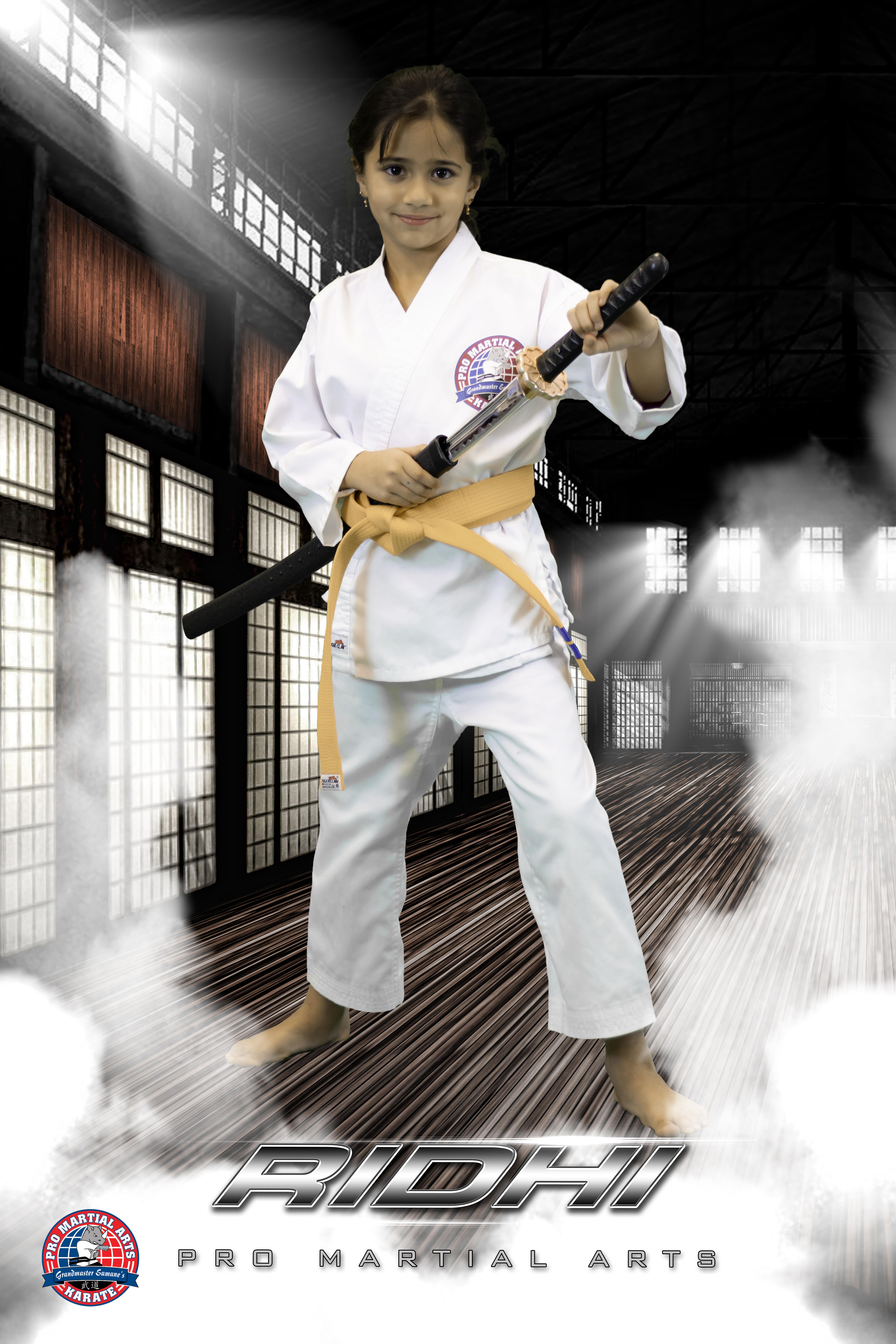 Ridhi with weapon in dojo